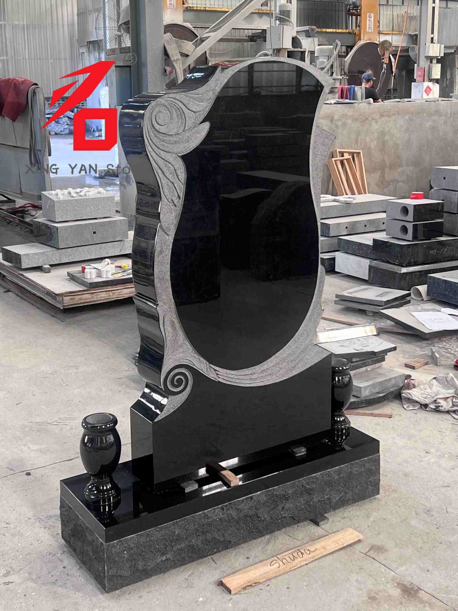 Tombstone granite granit ireng ireng