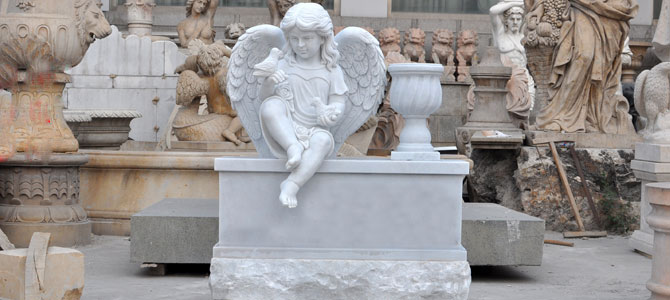 Patung watu xingyan wingyan angel